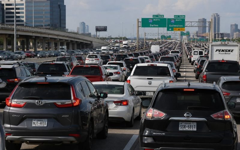 Heavy rush hour traffic congestion on a multi-lane highway in Houston Texas